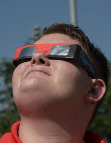 Matt viewing 2017 solar exlipse with classmates