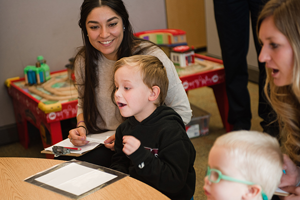 assert students helping kids