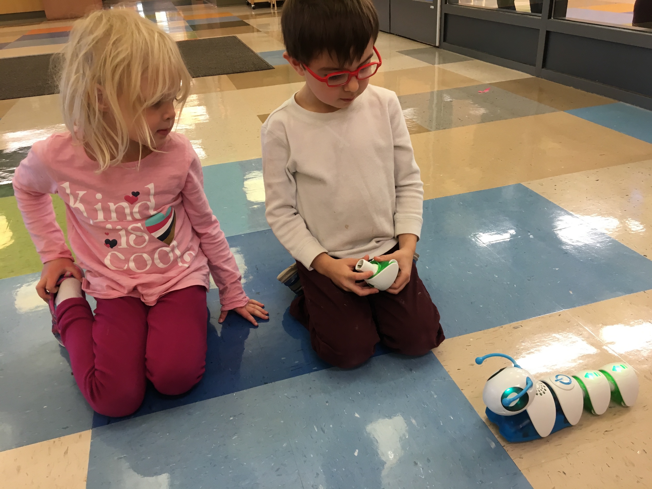 children at play with coding robots