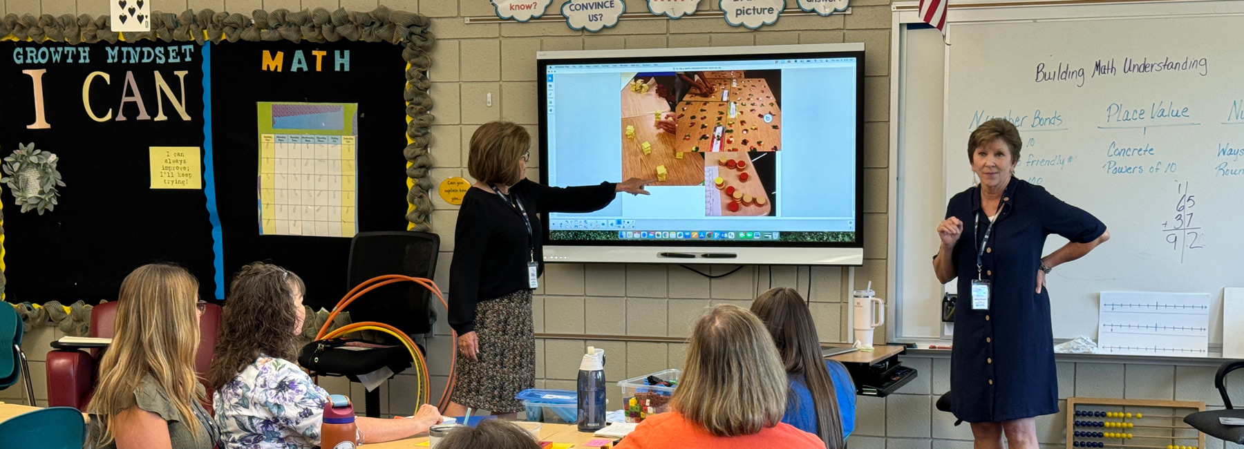 EBLS classroom with two teachers and multiple students.