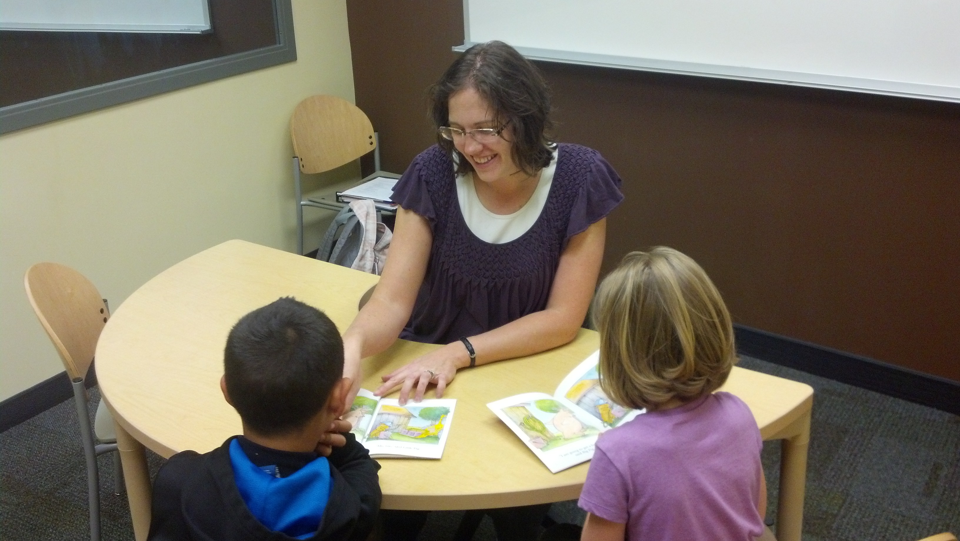 Teacher reading to children