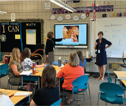 Teachers present strategies for upper grade math instruction.