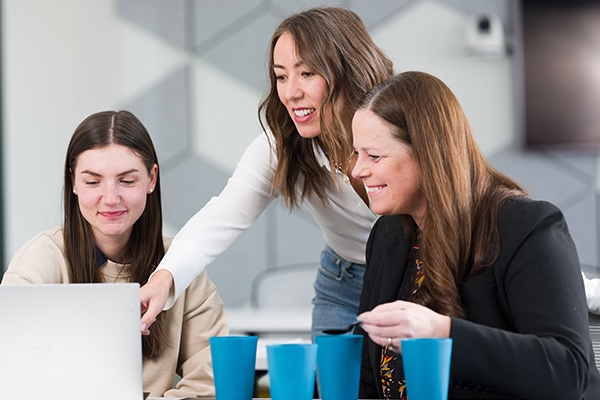 Researchers go over data together.