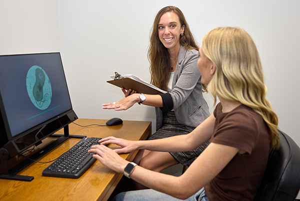 Weichert with undergraduate student