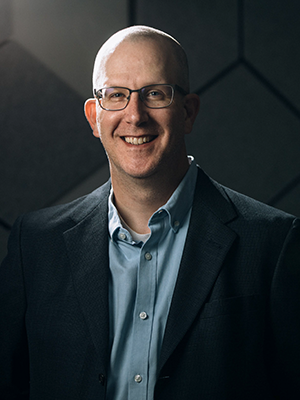 Dr. Andy Walker (he/his)