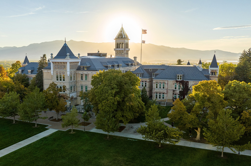 Aerial shot of old main hill with mountains in the background