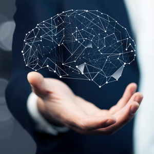 Man holding a brain prototype