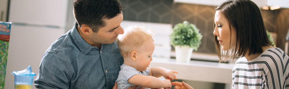 Parents feeding kid