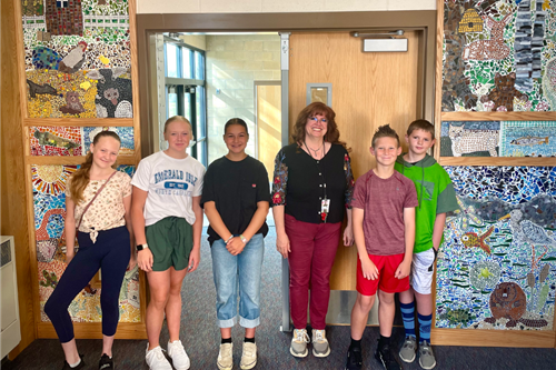 Sunrise Elementary students combine learning and creativity to create a mosaic of Utah