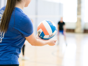 A girl playing basketball.